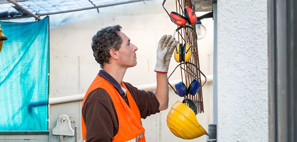 worker chooses hearing protector